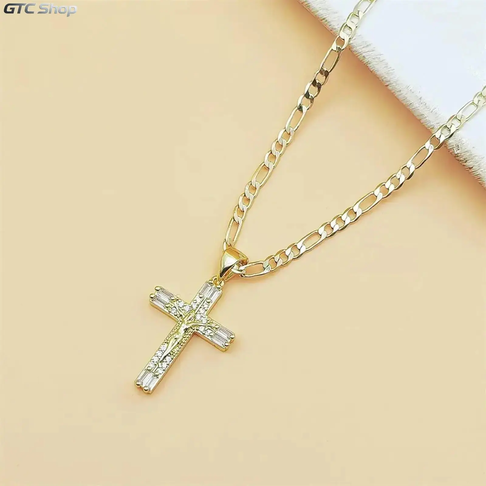 14K Gold Plated Crucifix Necklace with cubic zirconia inlay, paired with 60cm Figaro copper chain. Classic religious jewelry for men and women, ideal for daily wear and religious occasions.