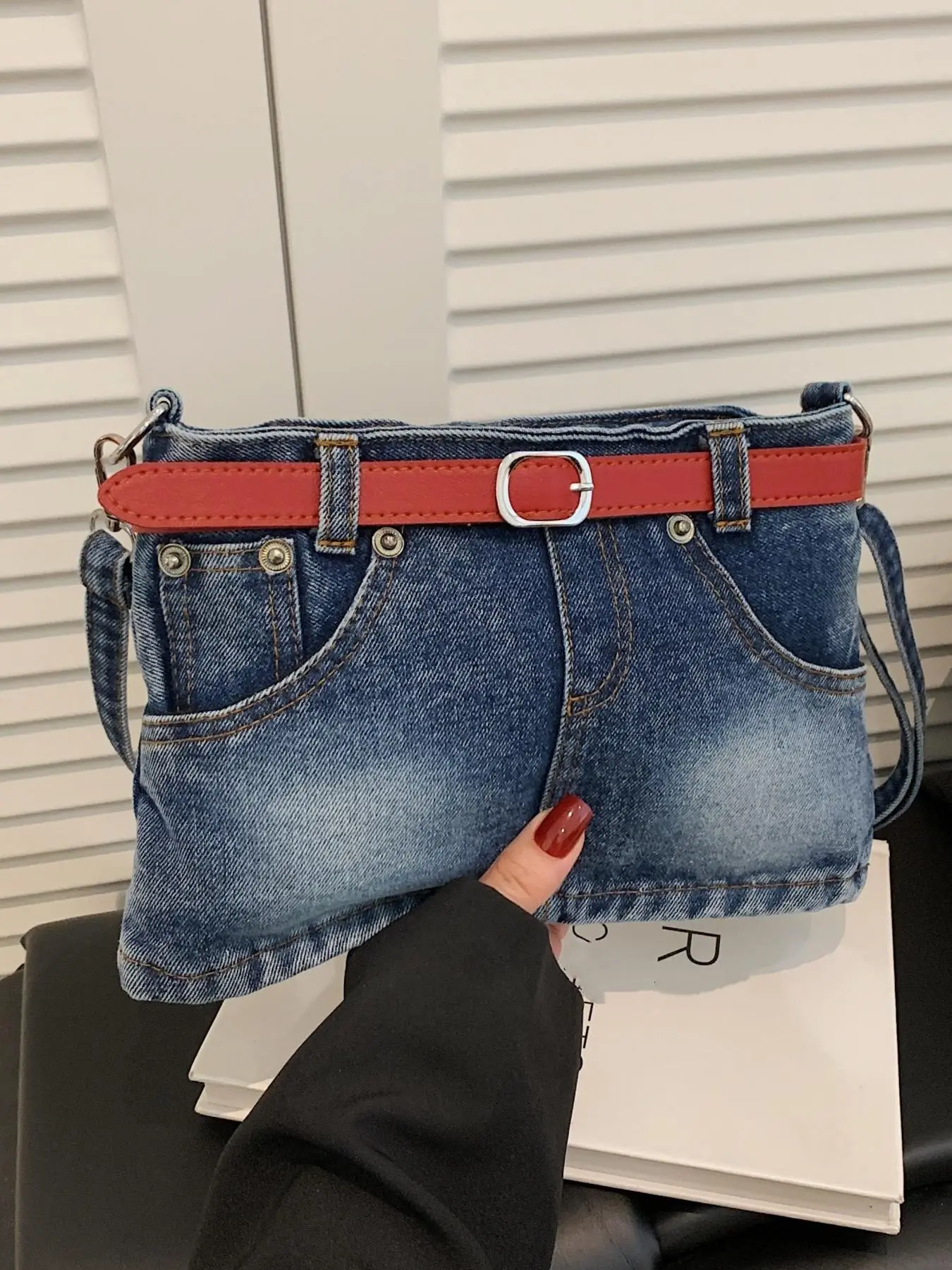 New casual denim skirt with single shoulder crossbody women's bag, featuring a red leather strap simple and stylish denim skirt underarm bag Crossbody Clutch Bag Fashionable Casual Bag Crossbody Shoulder Handbag