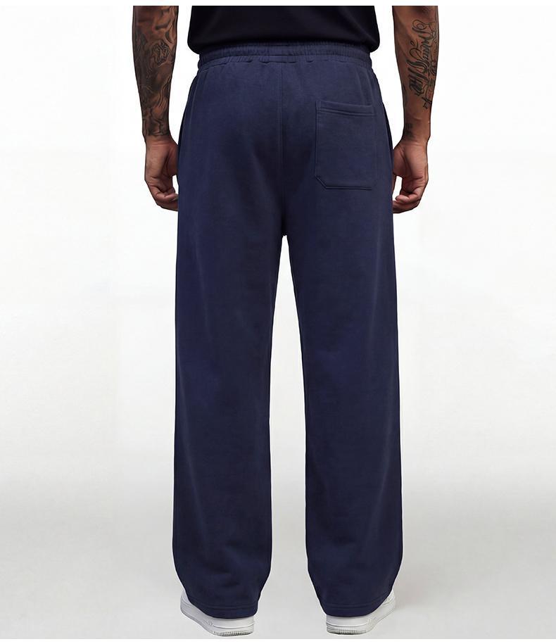 Black loose men’s sweatpants, extremely comfortable for everyday wear, skin-friendly men’s joggers, super comfortable with an elastic waistband, classic drawstring men’s casual sweatpants, suitable for various occasions, and perfect for wearing in spring