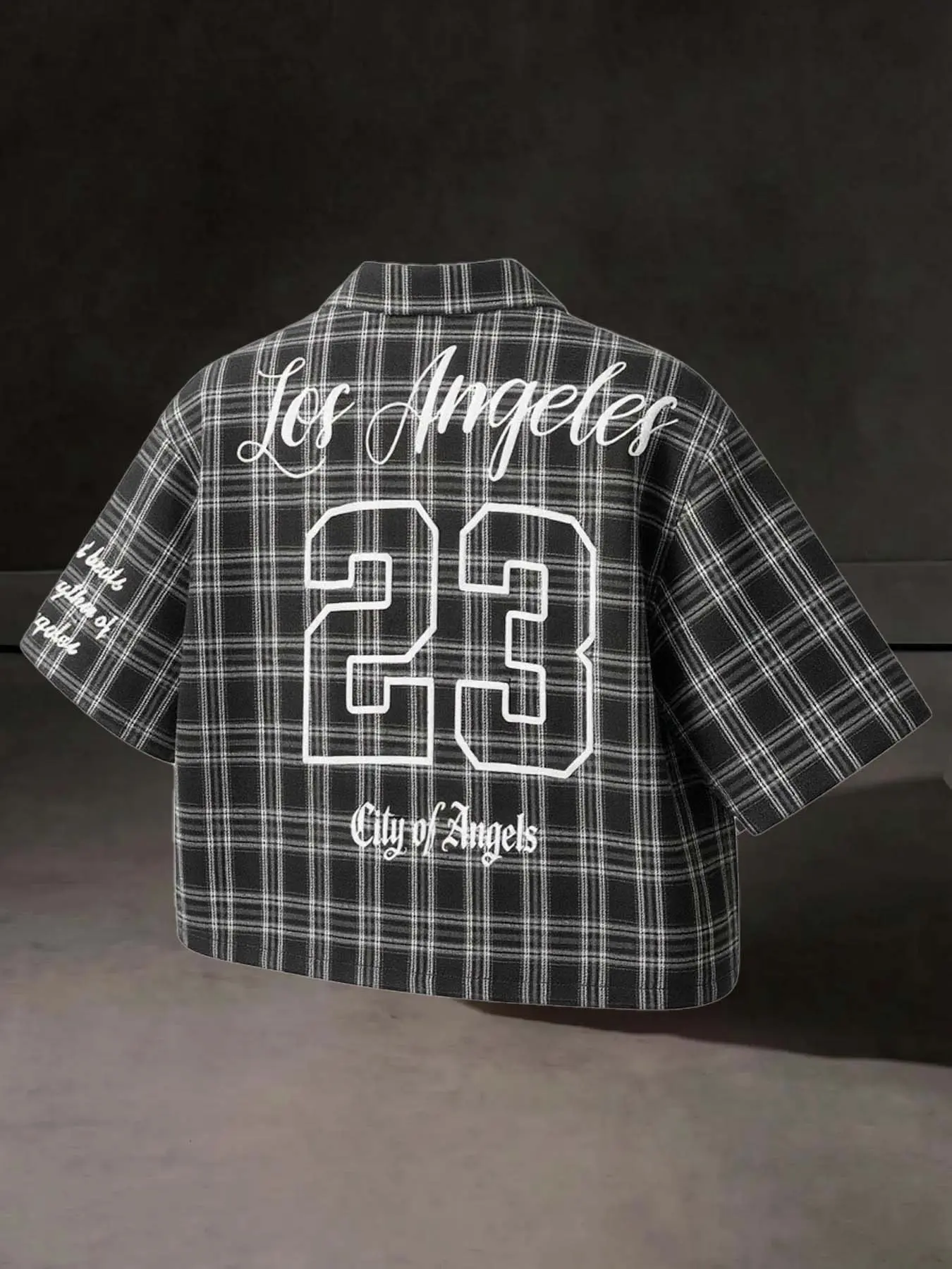 Men's Black White Plaid Cropped Lapel Short Sleeve Button Shirt, Menswear, Back Los Angeles 23 City of Angels Cursive Graphic Letter Print, Loose Oversized Street Fit, Light Wrinkle Resistant Woven Fabric, Y2K Hip Hop Fashion Casual Short Top