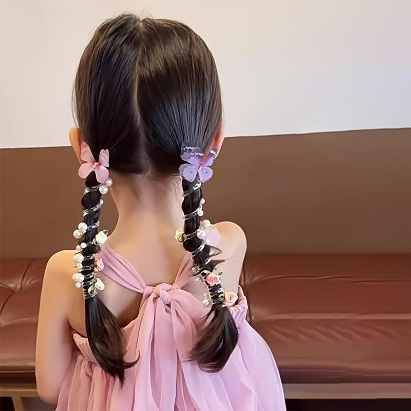 This set of three exquisite mesh butterfly-shaped telephone cord hair ties is perfect for girls.  Featuring a cute beaded flower design, these sweet hair accessories are suitable for everyday wear and parties.