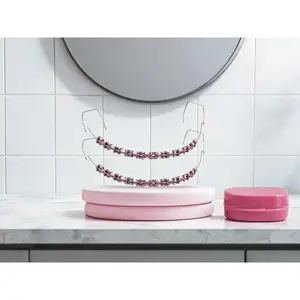 Colorful Metal Dental Braces Set,2-Piece Temporary Fake Braces Set, featuring metal wires, brackets and orthodontic bands in pink.Designed for dental student practice and orthodontic demonstration use.Solo Hot Shop