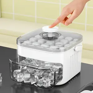A Portable Ice Tray That Can Make 50 Ice Cubes, Featuring an Easy-Press Lid And a Dual-Layer, Two-In-One Cube of Ice Storage Tray. It Is Designed to Take Up Minimal Space in The Refrigerator, Making It Perfect for Various Drinks
