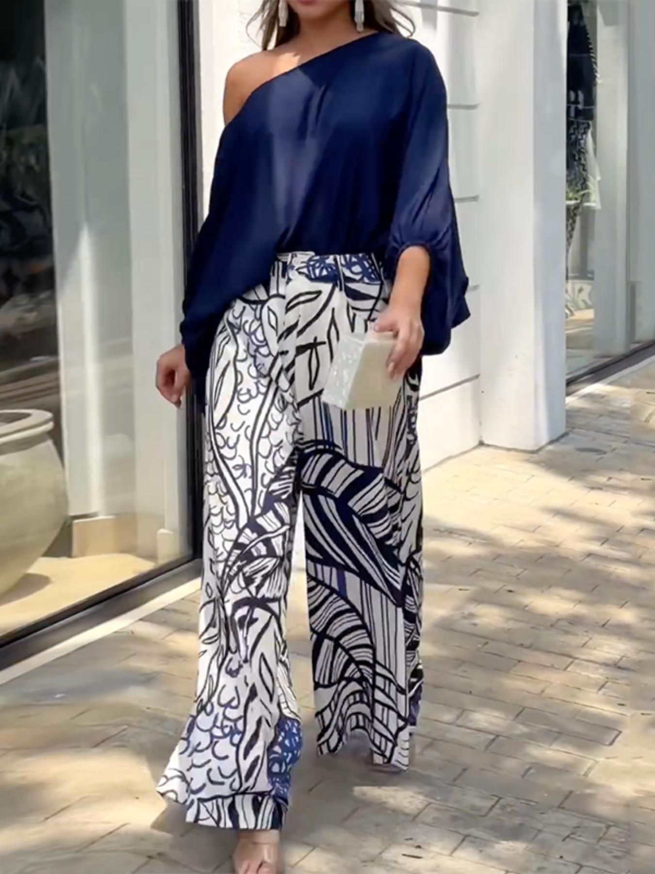 Solid color printed woven loose wide leg pants with bubble sleeves and off shoulder two-piece pants set matching clothing set
