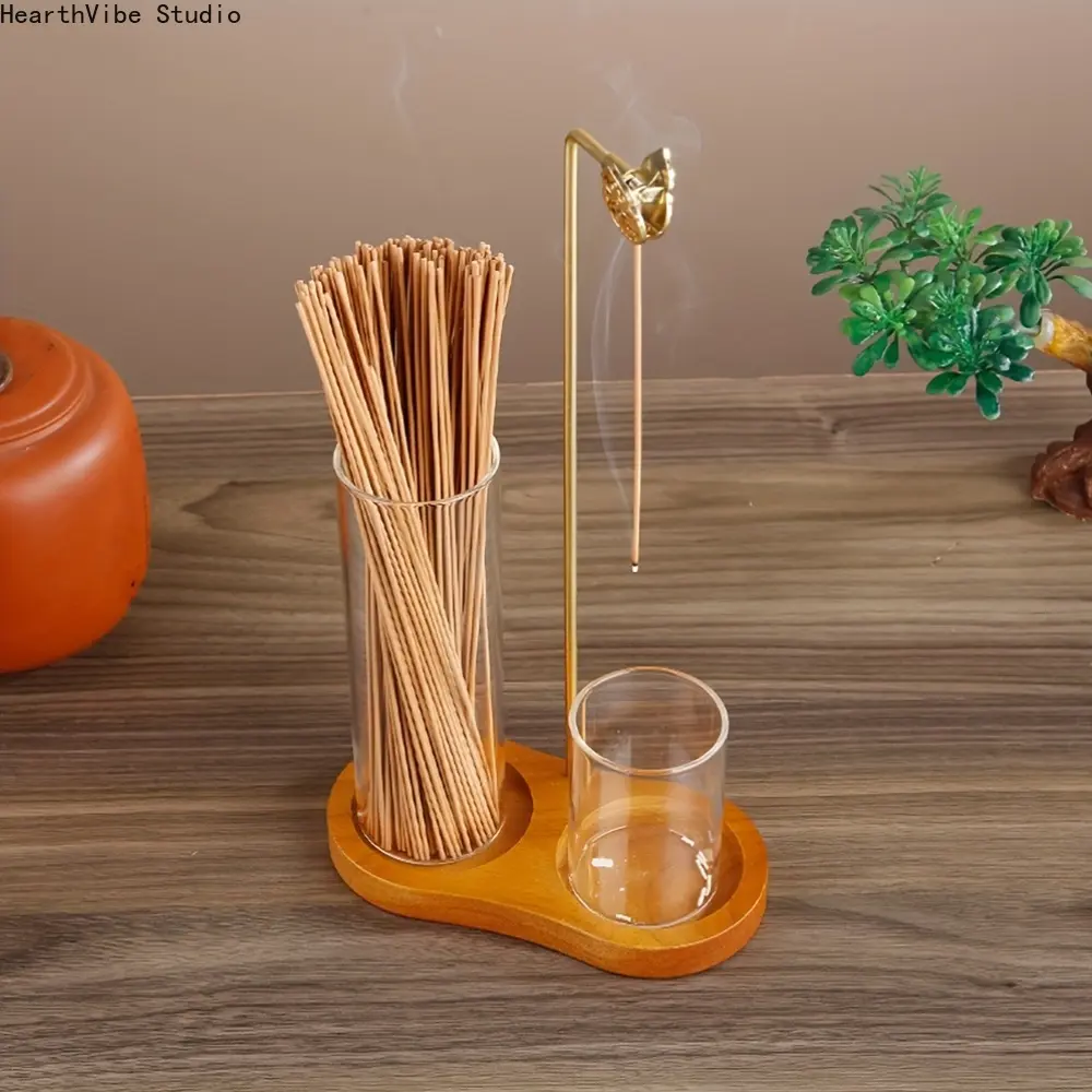Inverted-style solid wood incense burner featuring an embossed gourd-shaped incense holder, a glass ash-catching tube, and an oak base; suitable for ash-free use and as home decor for yoga spaces.
