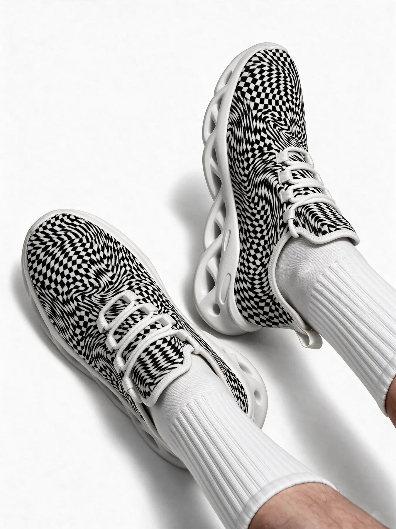 Black White Swirl Checkerboard Optical Illusion Shoes, Trendy Warped Chessboard Pattern Knit Mesh Sneakers, Lightweight Hollow Cushion Platform Sole Casual Athletic Running Trainers Unisex Daily Streetwear Footwear