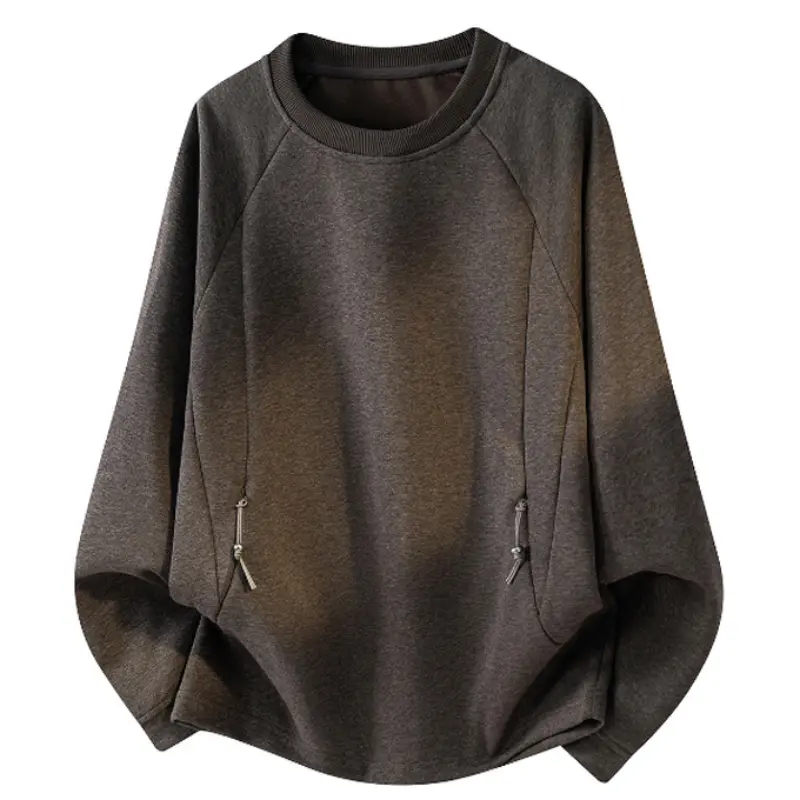 Dark heather crew neck sweatshirt with raglan sleeves, side zipper pocket details, curved hem design, soft thick fabric, relaxed loose fit, functional casual long sleeve pullover for outdoor and daily street styling