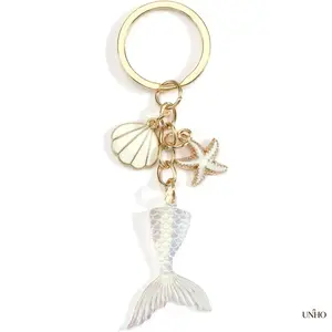 Coastal Beach Themed Key Ring Bag Charm For Women, Dreamy Mermaid Tail Pendant Decorated With Seashell Conch And Starfish Charms, Nautical Vacation Aesthetic Daily Accessory, Perfect Sentimental Birthday Gift For Beach Lovers And Female Friends