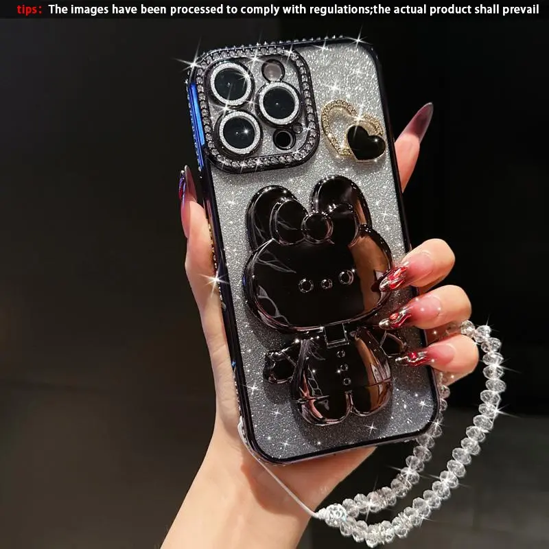Sparkling Kt Rabbit Mirror Stand Phone Case with Beaded Bracelet, Anti-Drop Protection for iPhone 17 Pro Max 16 Pro Max 15 14 13 12 11