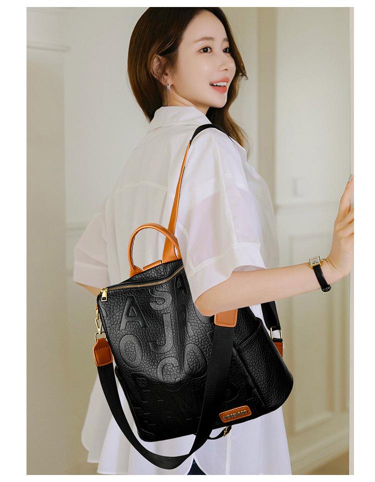 Embossed large-letter backpack, 2026 popular color-blocking multi-functional travel backpack, textured soft leather school bag for female students