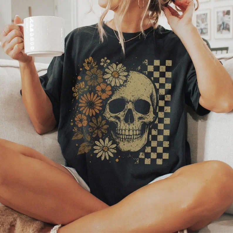 Boho Skull Vintage Graphic T-Shirt Retro Summerween Spooky Aesthetic Tee Cute Halloween Floral Skull Apparel Hippie Spooky Season Gift Viral Trendy Summer Halloween Streetwear Unisex Heavy Cotton Casual Fashion Top Ultra-Soft Comfy Fabric Womenswear