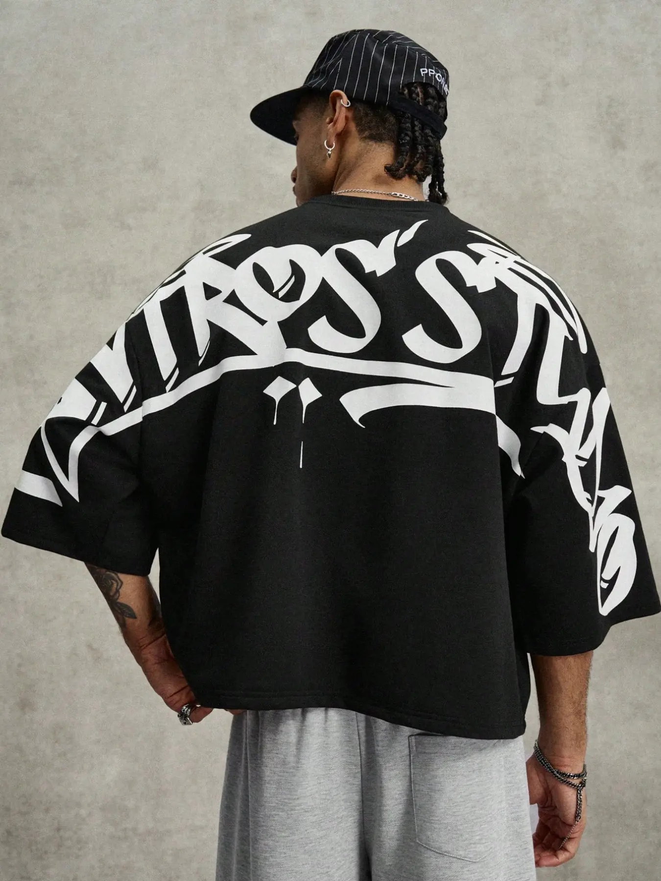 Y2K Urban Street Graffiti, Graphic, Casual Graphic Tee, Oversized Cropped T-Shirt, Streetwear, Unisex Loose Fit Crew Neck Short-Sleeve Top Made of Lightweight Fabric for Casual Wear, Features Black-and-White Graffiti Print on the Back