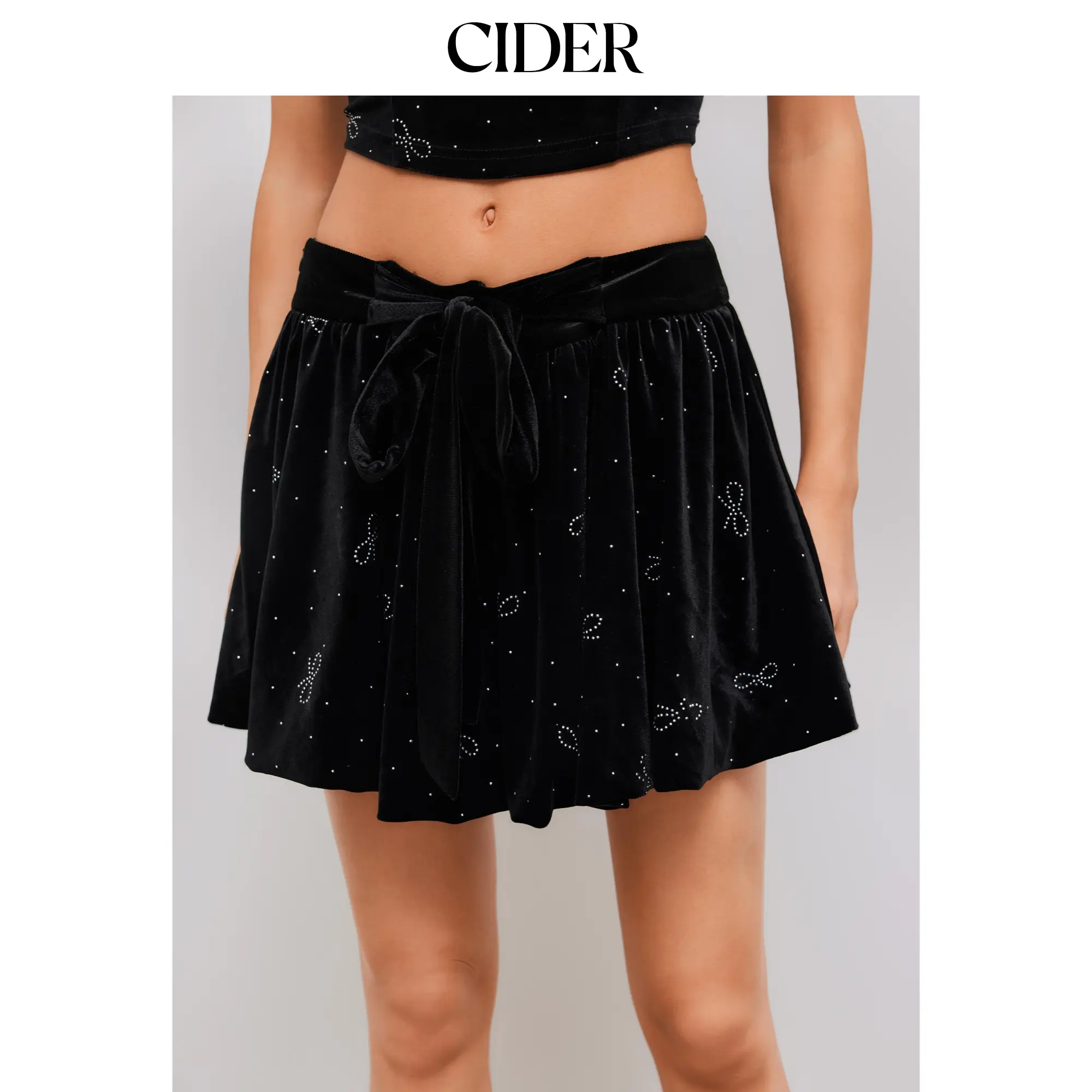 Cider [size 2-10] Velvet Mid Rise Rhinestone Bowknot Knotted Mini Skirt