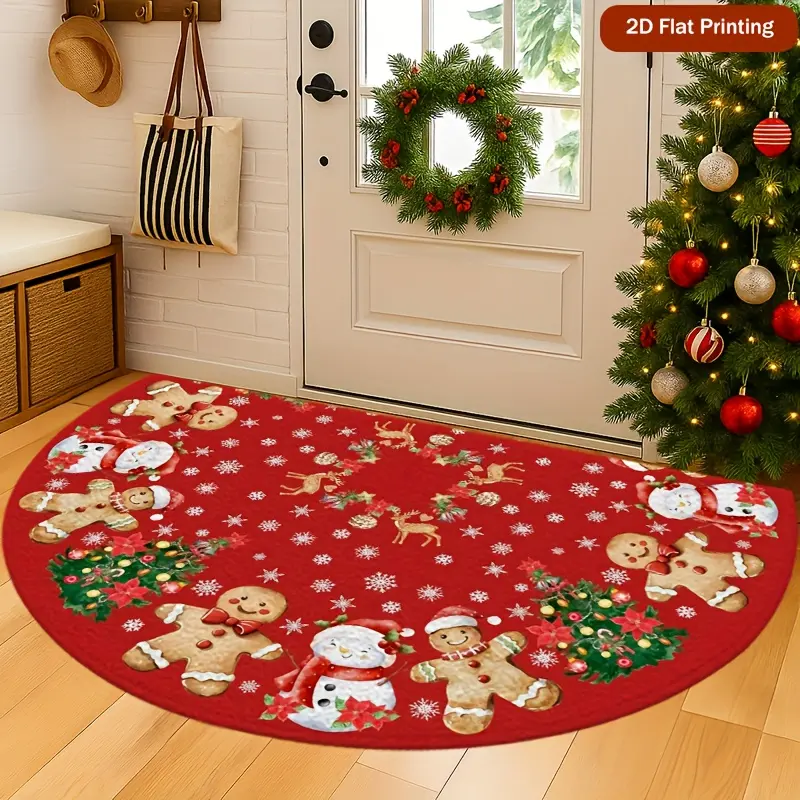 A Christmas semi-circular doormat featuring red gingerbread men and snowflakes, this non-slip floor mat is perfect for indoor and outdoor use, perfect for entrances, hallways, gardens, and kitchens