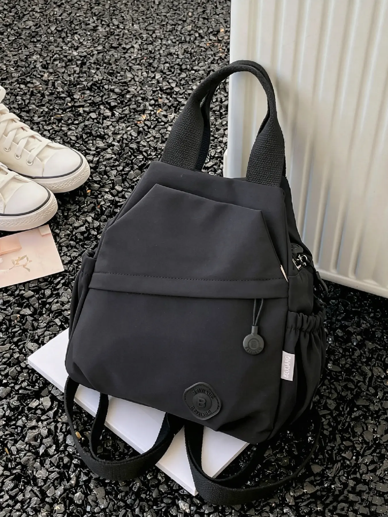 Solid color lightweight nylon mini backpack, detachable wide shoulder strap, side drawstring storage pocket, multifunctional chest bag for couples, suitable for daily outings
