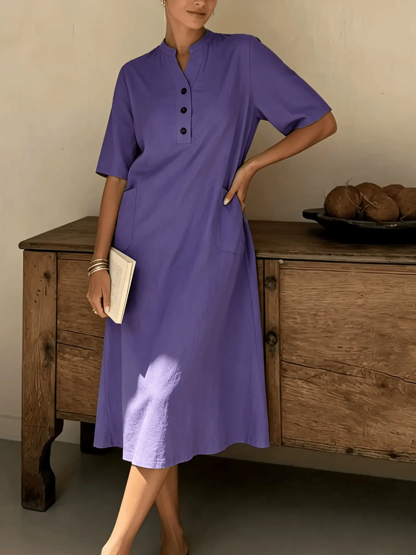 A women's fashionable, artistic, vintage, casual wear dress with a stand collar, three buttons, loose fit, and covers the body, suitable for summer, family gatherings, afternoon tea, walks, picnics, and commuting.