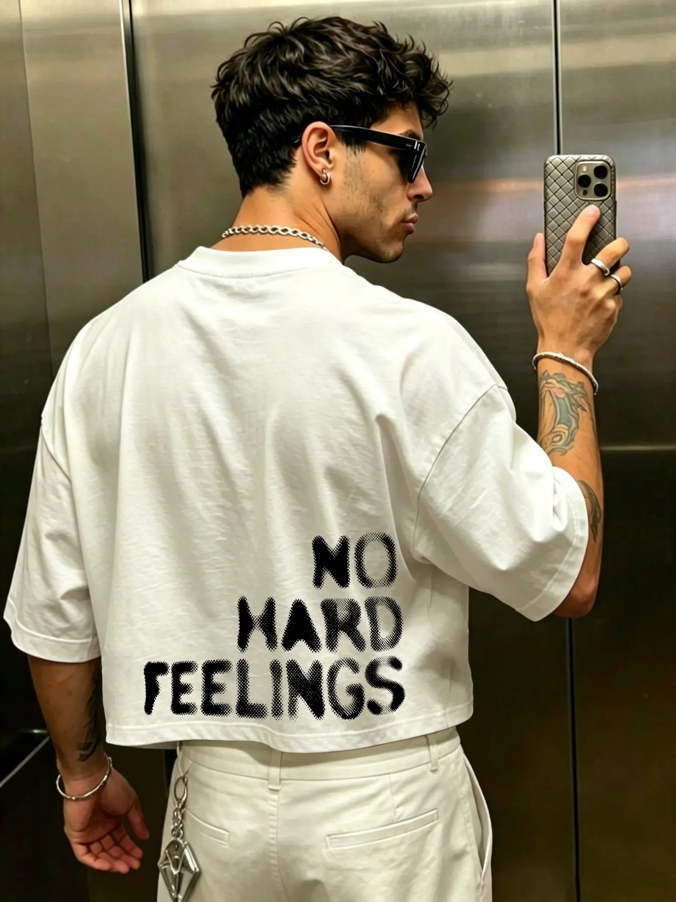Men's T-shirt featuring a loose, cropped fit with dropped shoulders; made from 100% Sorona polyester fabric; adorned with a playful cartoon print. An essential basic—Casual, perfect for hot summer vacation outfits.