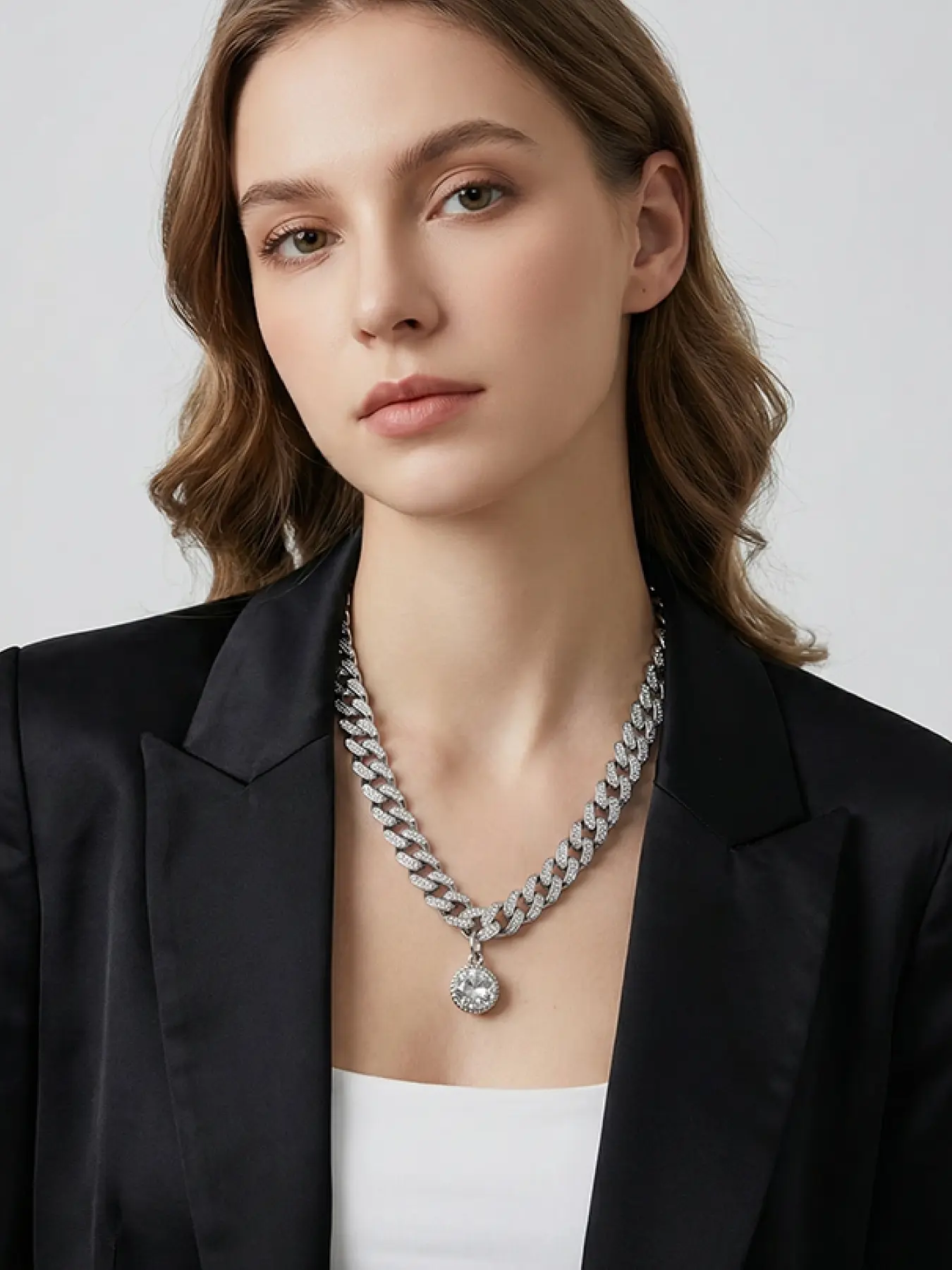A full diamond silver Cuban chain necklace, paired with a round large diamond pendant, combines street fashion with exquisite sparkle, suitable for daily outings, parties, or trendy outfits.