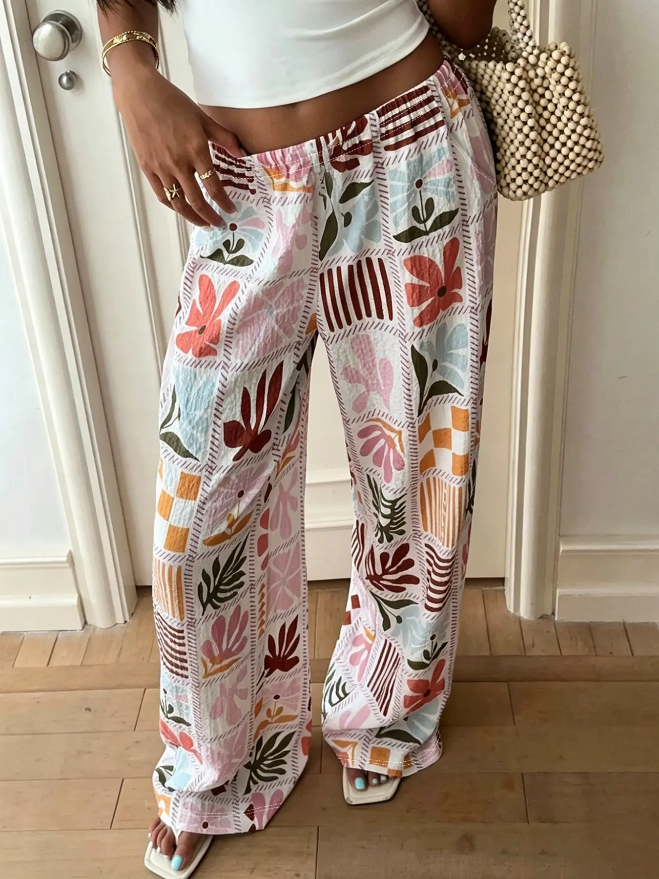 Bohemian patchwork floral wide-leg pants, comfortable and breathable high-waist flowy wide-leg pants, vintage geometric leaf print vacation beach casual pants, cute summer casual bottoms, perfect for holiday outfits for all body types.