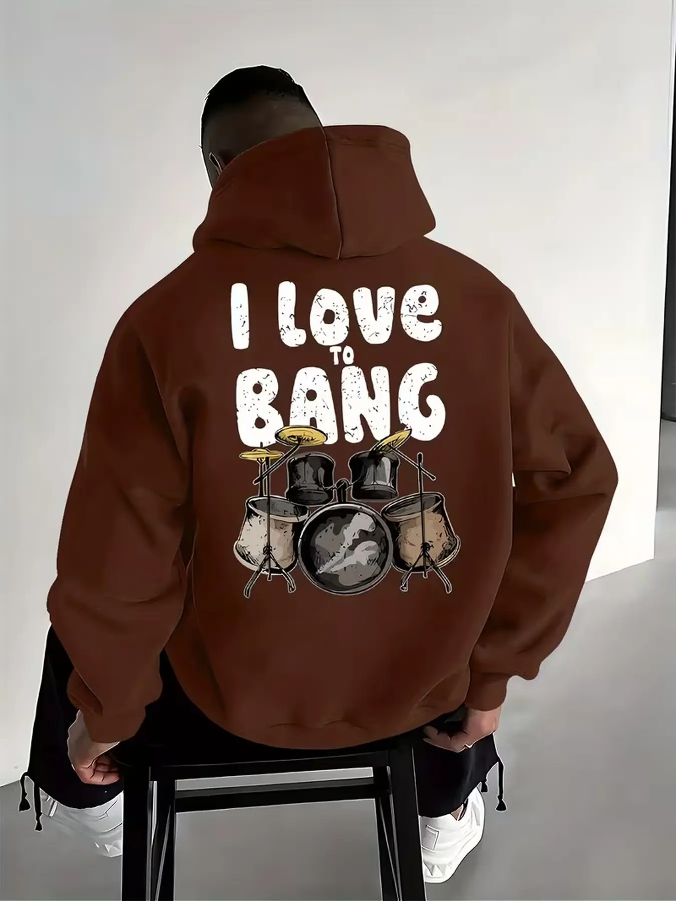 Men's versatile casual pullover hoodie with drum graphic print, suitable for home leisure and outdoor daily wear.