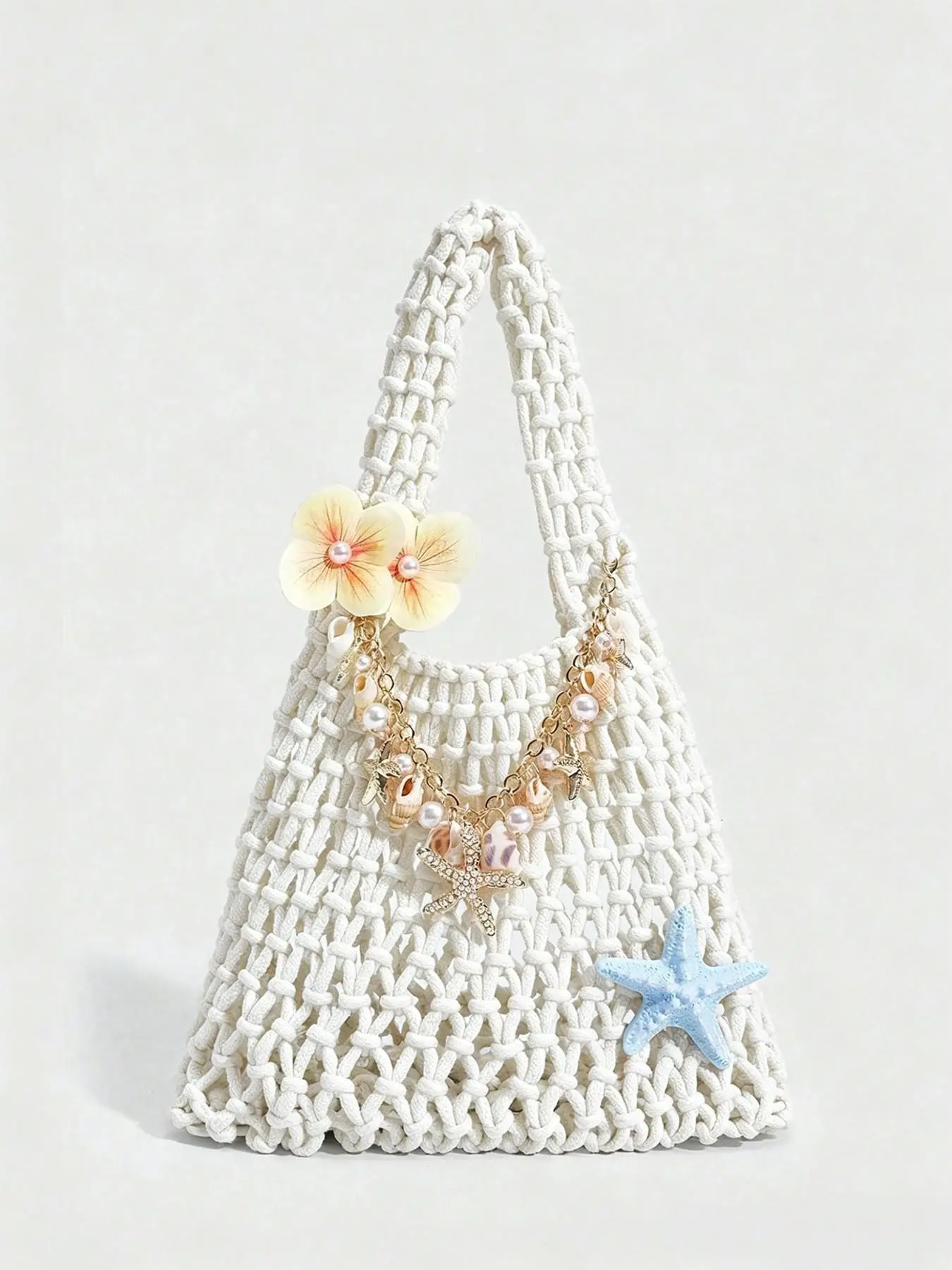 Fresh and artistic style woven shoulder bag, Aesthetic shoulder bag, Crossbody Bags, hollow rope knot design, three-dimensional flower decoration, ocean element chain pendant decoration, suitable for beach vacation and outdoor travel