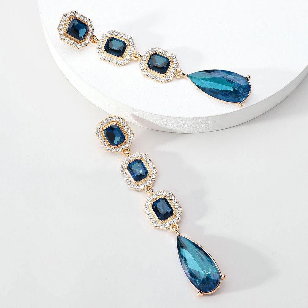 European and American fashion-inspired, premium-designed long-drop-shaped crystal earrings with a dazzling shine. Elegant, versatile, and perfect for cross-border purchases.