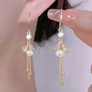 Pair of Premium Design Red New Long Tassel Drop Earrings with Beads and Leaf Motifs, Elegant Women's Accessories for Festivals, Parties, Vacations, and Gifting