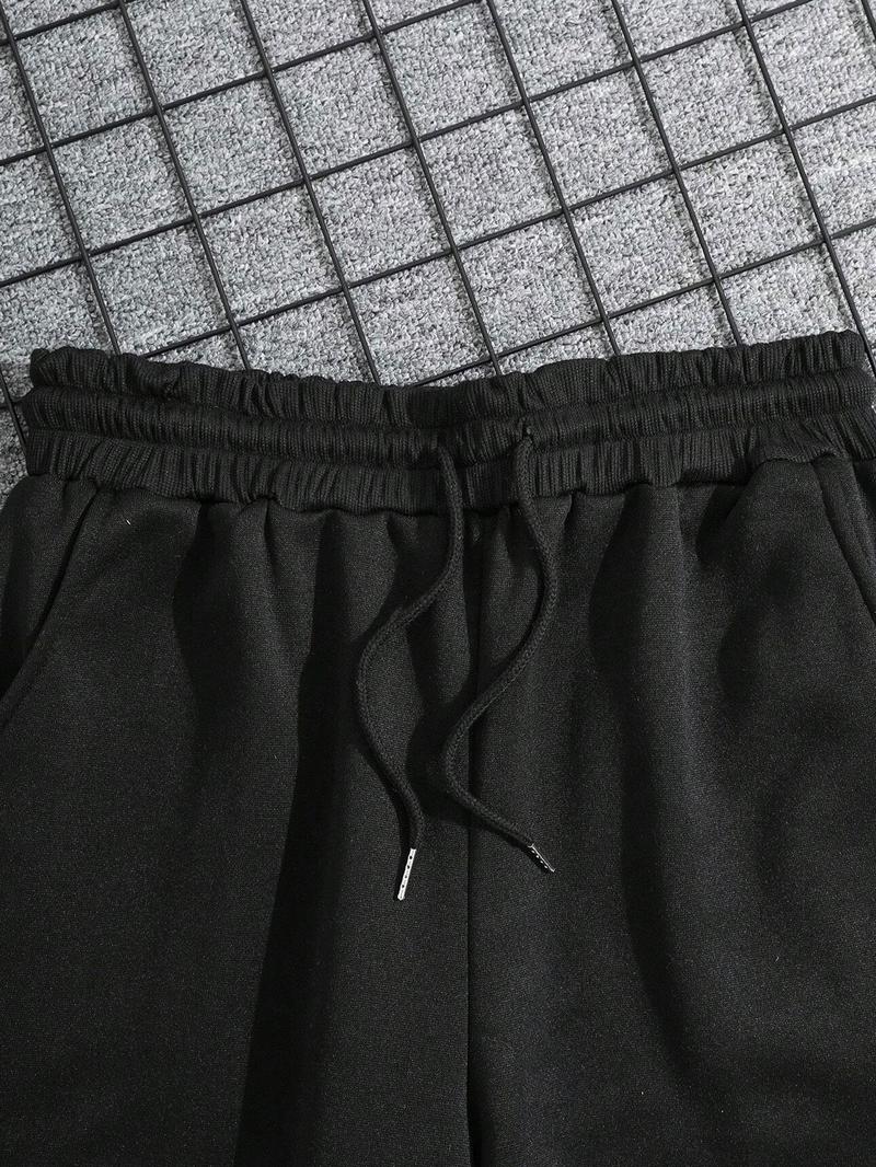 Trendy Black Fleece - lined Sweatpants with "KASH" Lettering, Star and Flame Graphics, Ideal for Street - style and Hip - hop Wear, Trending on TikTok #Sweatpants #StreetFashion #TikTokTrend, Sports Casual Pants