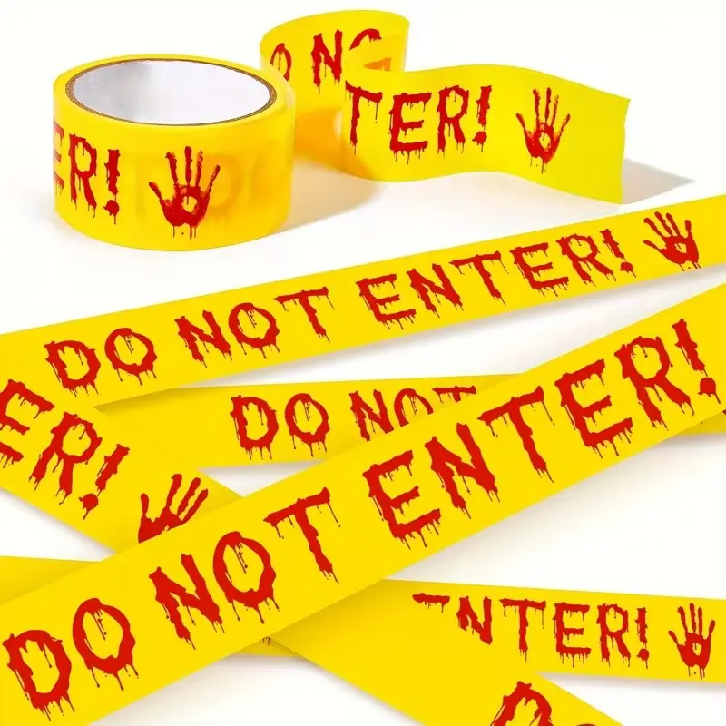 1 roll Halloween warning tape yellow Please do not enter the warning tape with bloody handprints. The scary zombie scare tape is used to decorate haunted houses and dangerous areas at Halloween parties.
