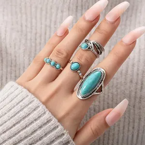 Vintage Bohemian Feather & Turquoise Ring Set | 4-Piece Stackable Rings & Trendy Statement Jewelry for Women