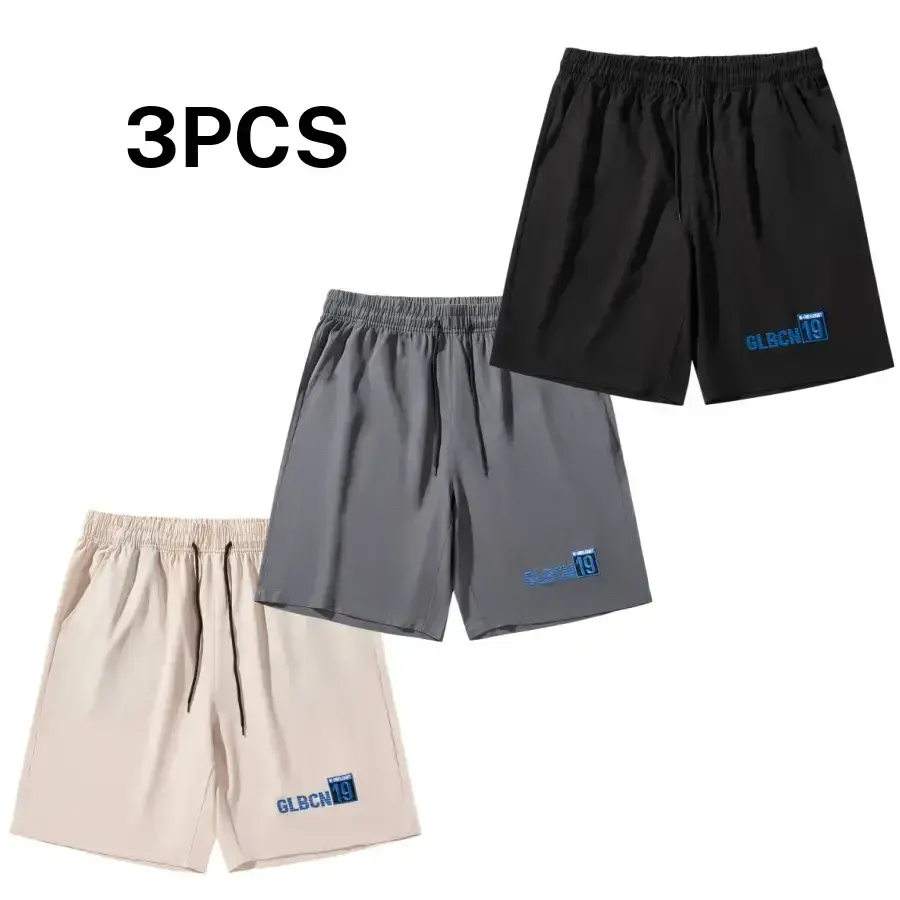 Men’s shorts with three letter embroidery, featuring a casual minimalist style. A drawstring waistband allows for adjustable tightness, while blue letter embroidery on the sides adds a trendy touch. The smooth, drapey fabric resists wrinkles, and the loos