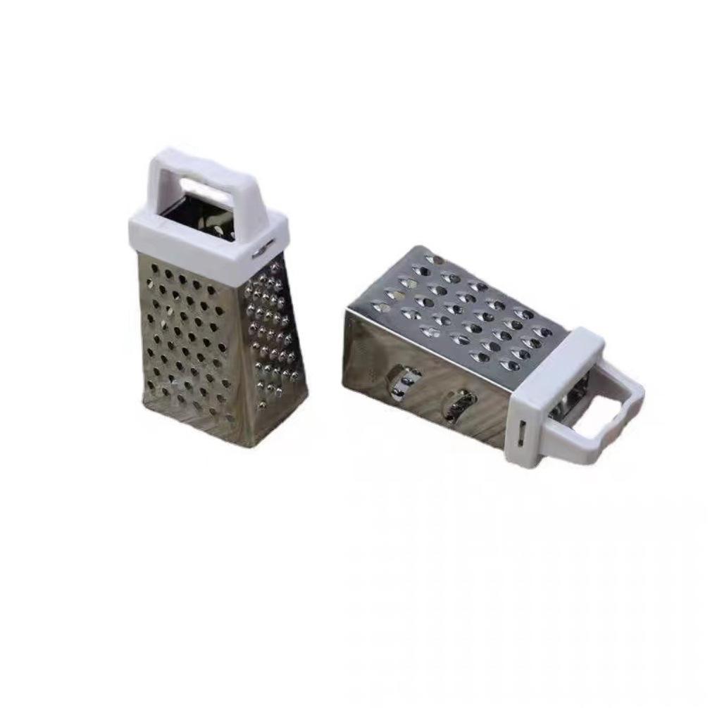 Multifunctional stainless steel household tool for peeling garlic, slicing vegetables and fruits, and shredding potatoes