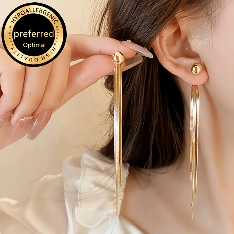 2026 new tassel earrings for women, niche design, light luxury, high-end feel, elegant, high-quality, hypoallergenic, long earrings, creative and simple snake bone design, unique and exaggerated earrings
