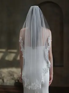 Elegant mid-length bridal veil featuring soft tulle and delicate floral lace trim—a French-inspired, affordable luxury accessory perfect for weddings and bridal photography. Wedding veils for brides The wedding veil