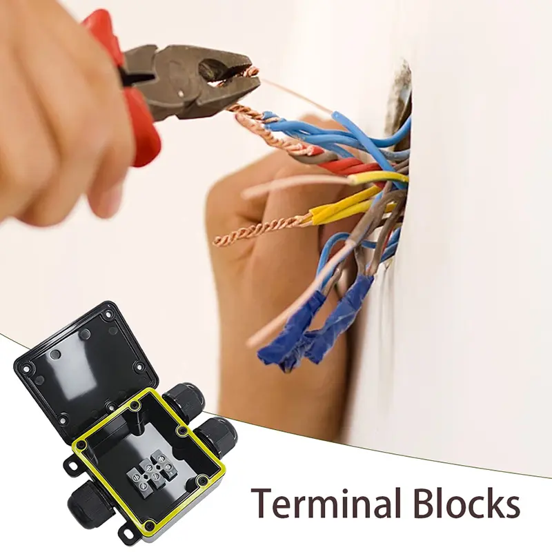 A black junction box with one inlet and two outlets, equipped with terminal blocks, suitable for outdoor use, and easy to operate
