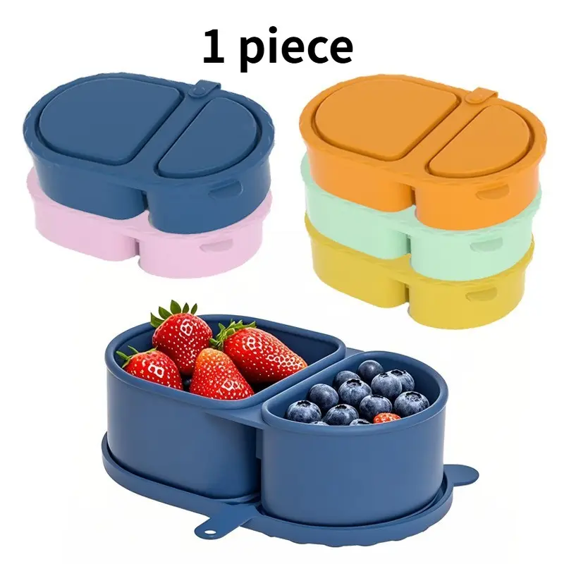 A reusable, double-compartment silicone snack container with a lid. This leak-proof, portable lunchbox is perfect for outdoor picnics, storing fruits, nuts, and sauces.