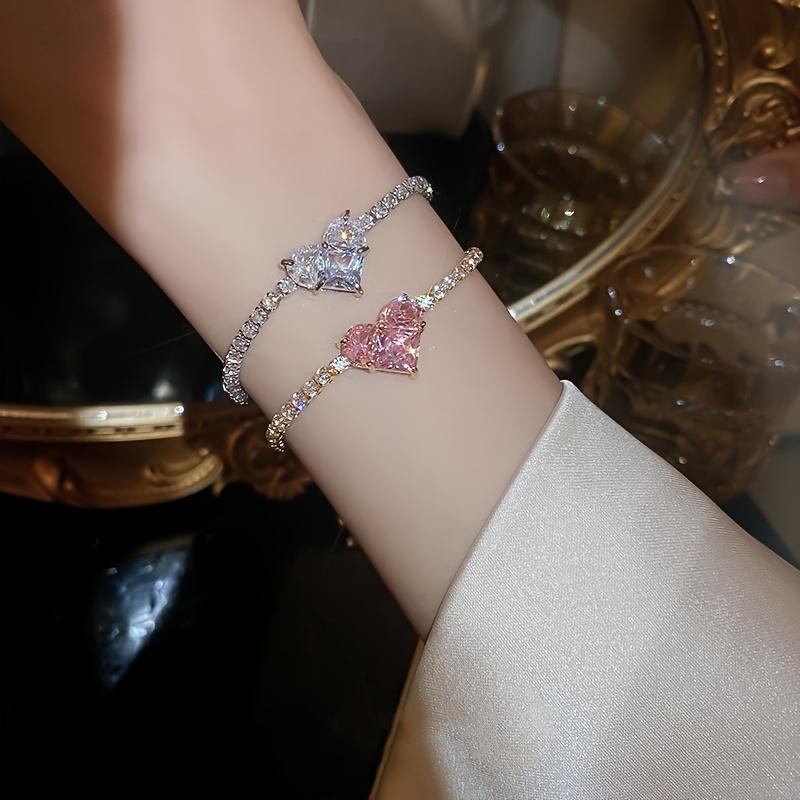 A Luxurious Heart-Shaped Adjustable Bracelet, Adorned with Zirconia - a Stylish Accessory Made of Copper, Perfect As a Gift for a Loved One, Partner, Or Best Friend
