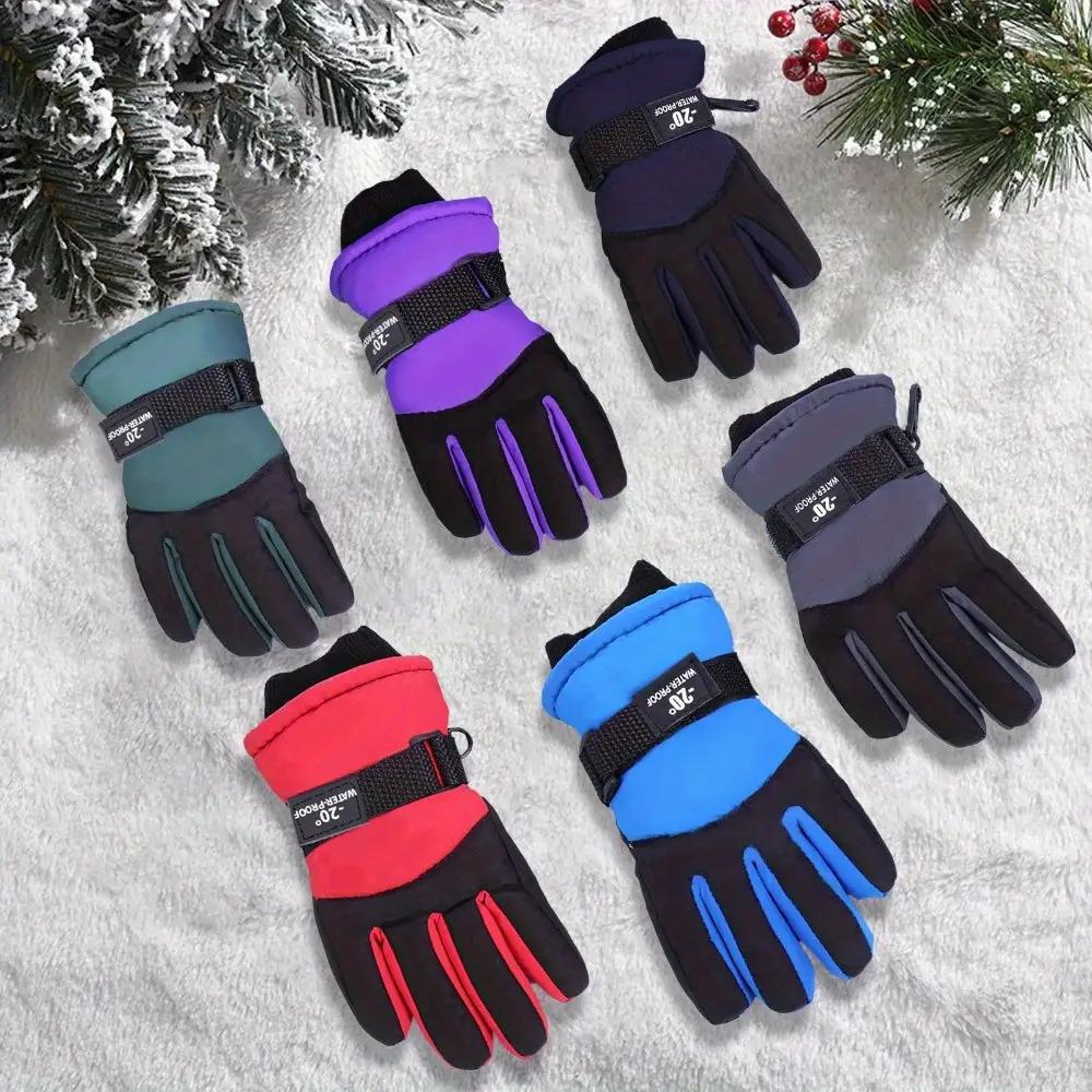 A Set of Kids' Ski Gloves Designed for Warmth During Winter Sports, Featuring an Elastic Wristband And a Zip Closure. Ideal for Children Aged Three And Older, Available in Eight Colors, Perfect for Skiing, Biking, And Outdoor Winter Activities