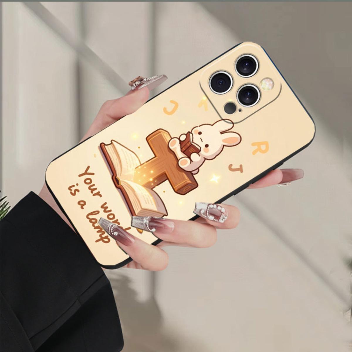 Phone Case: Cute Rabbit Reading The Bible With Cross Design, Featuring A Luminous Effect And Floating Letters, A Faith-Inspired Christian Phone Case Design, Suitable For IPhone 17/17pro/16/X/XS/XR/11/12/13/14/15/16Plus/17ProMax, Printed Liquid-Like Phone