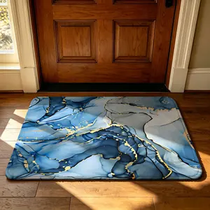 A rectangular blue and gold ink marble patterned entryway floor mat, with a soft, machine-washable silicone fleece-lined edge, suitable for use as a dirt-resistant mat at the entrance, in bedrooms, bathrooms, or next to beds; as a decorative mat in