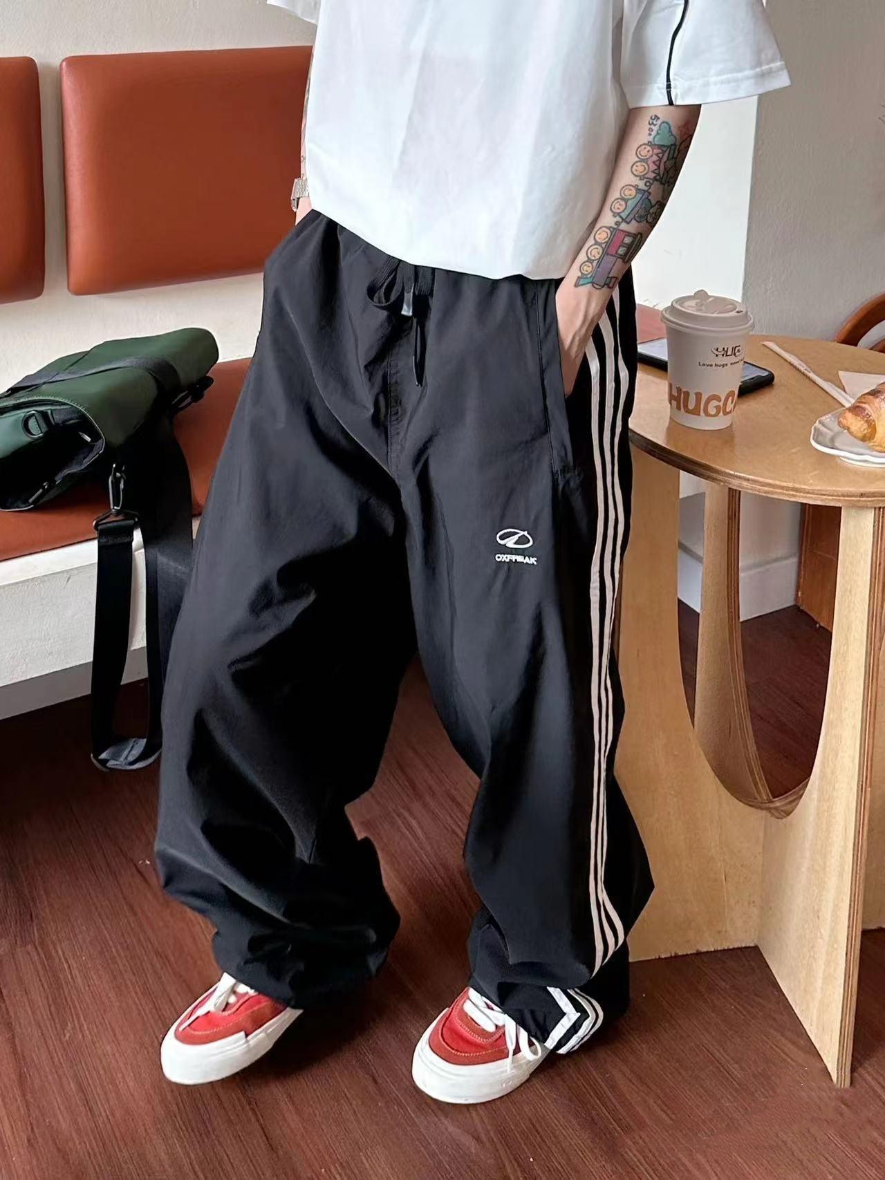 Men's vintage street-style quick-dry striped straight-leg casual pants, autumn trendy and versatile vibe loose sweatpants with a striped design aesthetic.