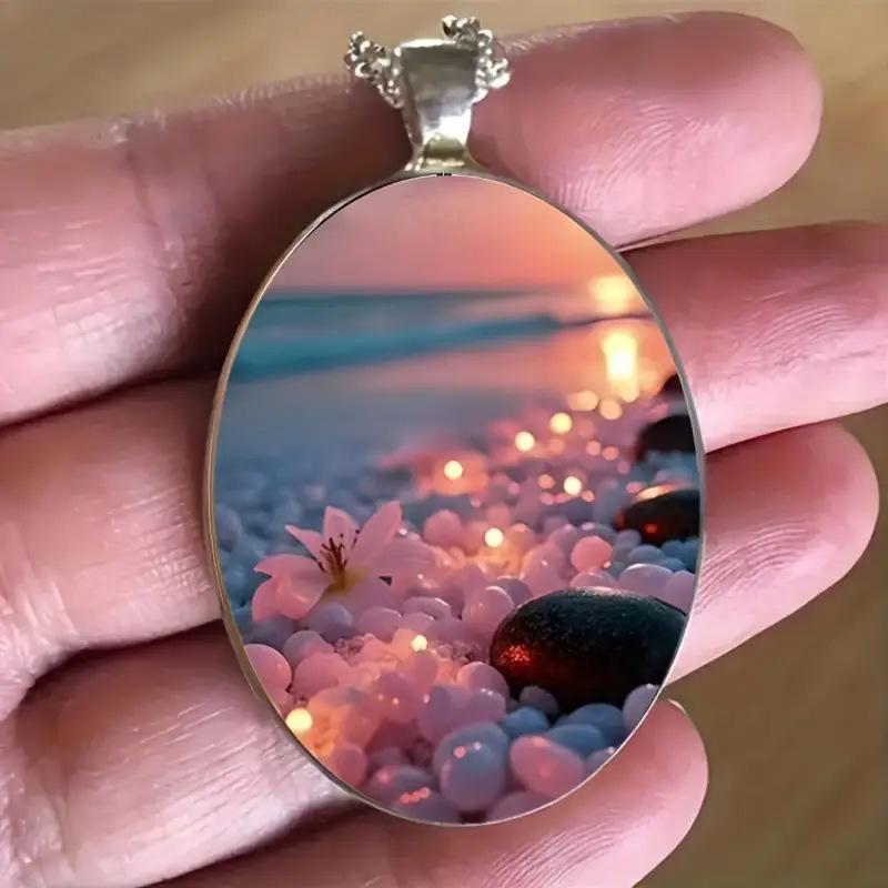 A beautiful summer beach ocean-themed oval-shaped silver alloy glass pendant and stainless steel chain
