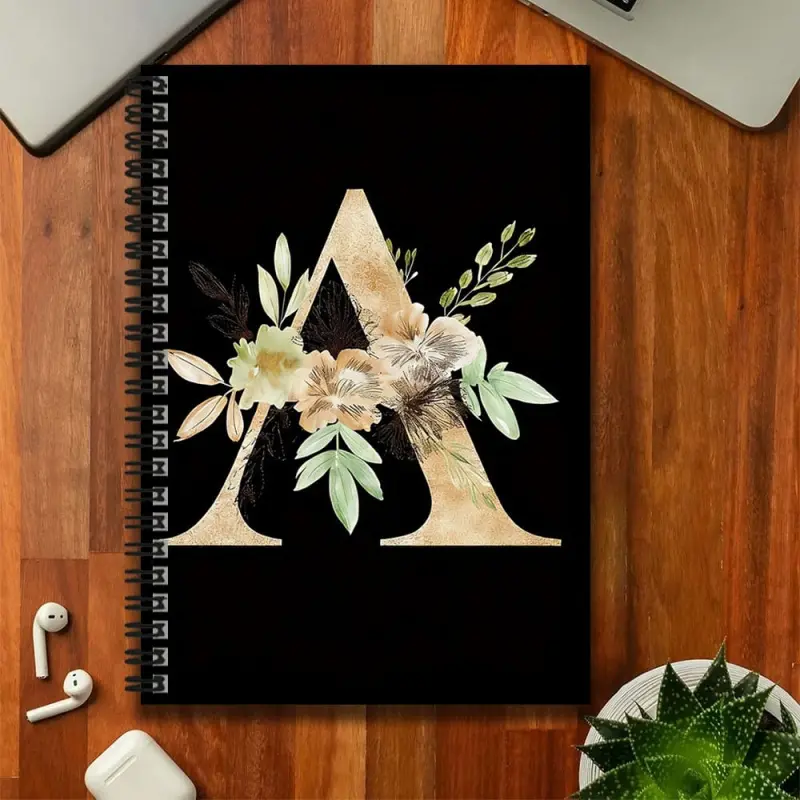 An artistic floral-letter style spiral coil notebook, a great aid for work and study, with a simple and elegant design. Whether it's for keeping a diary, making daily plans, or using it as a notepad, it's very suitable. A thoughtful gift choice for gradua