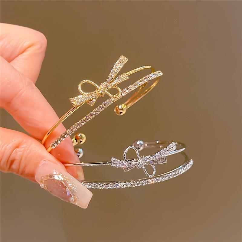 Elegant Gold Bow Bracelet with Synthetic Cubic Zirconia Inlay, Women's Open Design Bracelet for Casual and Special Occasions