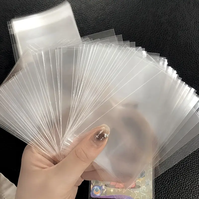 200 Pieces 2.56x3.54 inch Clear Card Sleeves - Stain-resistant PP Plastic Open-top Self-sealing Protectors, suitable for transaction cards, sports collectibles, small cards and photo album protection, card sleeves
