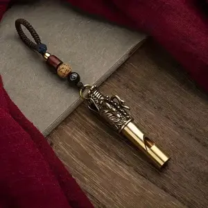 Brass Outdoor Survival Whistle with Lanyard for Hiking and Camping, Compact Emergency Signal Tool, Durable Keychain Accessory for Daily Carry