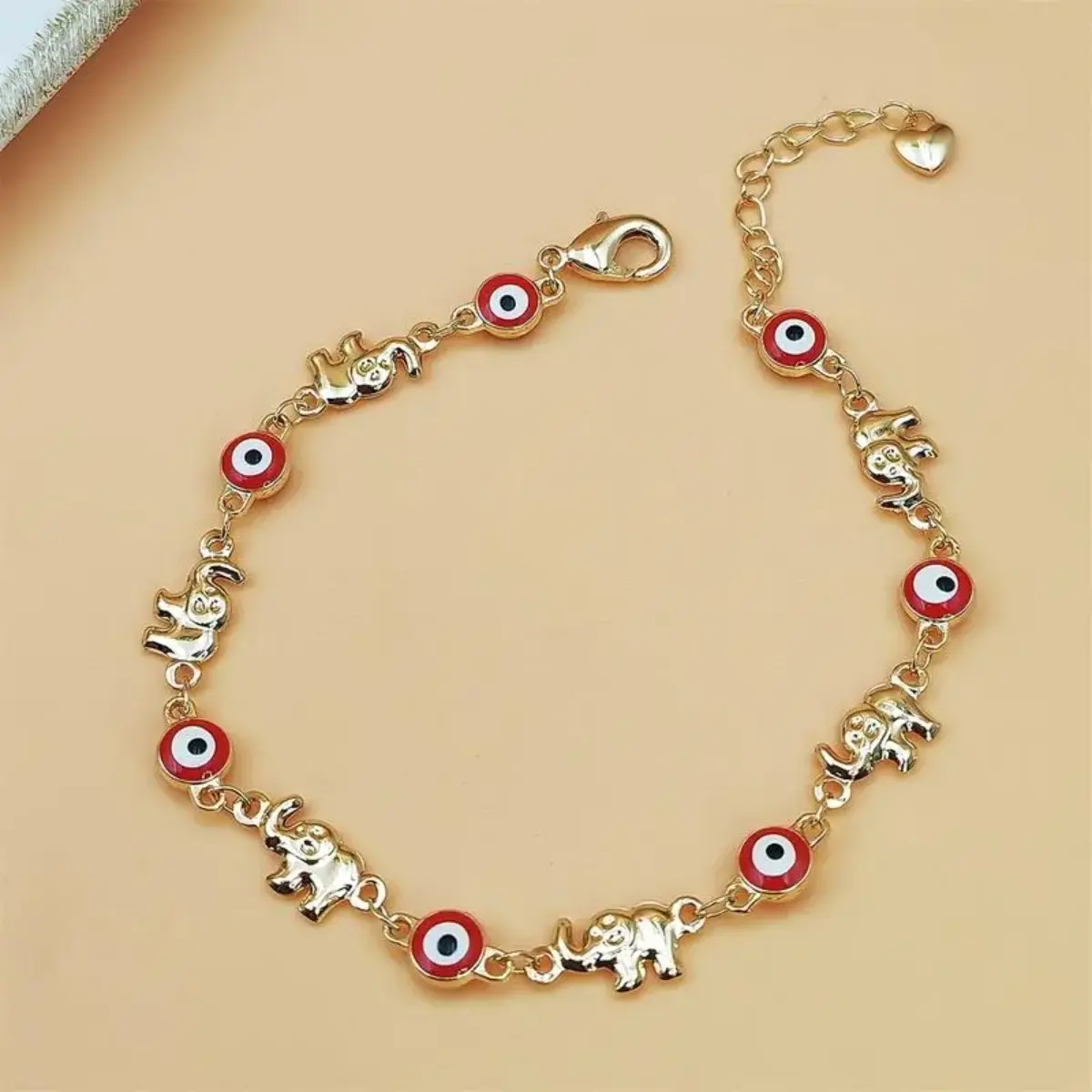 Boho Elephant Charm Bracelet for Women – Gold Tone Adjustable Metal Bracelet with Red Eye Pendant, Fashion Gift Jewelry