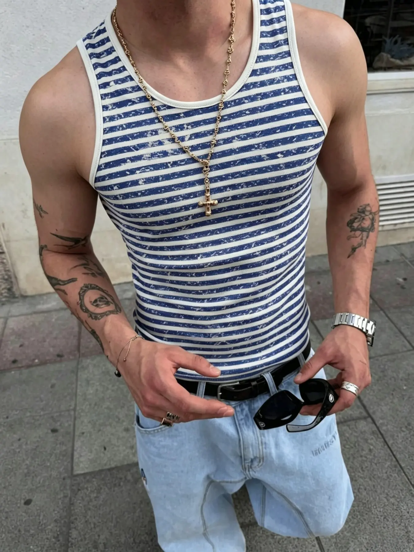 Men's casual tank top O Neck Sleeveless featuring blue and white stripes and a minimalist color design; crafted from skin-friendly cotton with a slim fit, it is suitable for summer and everyday wear.