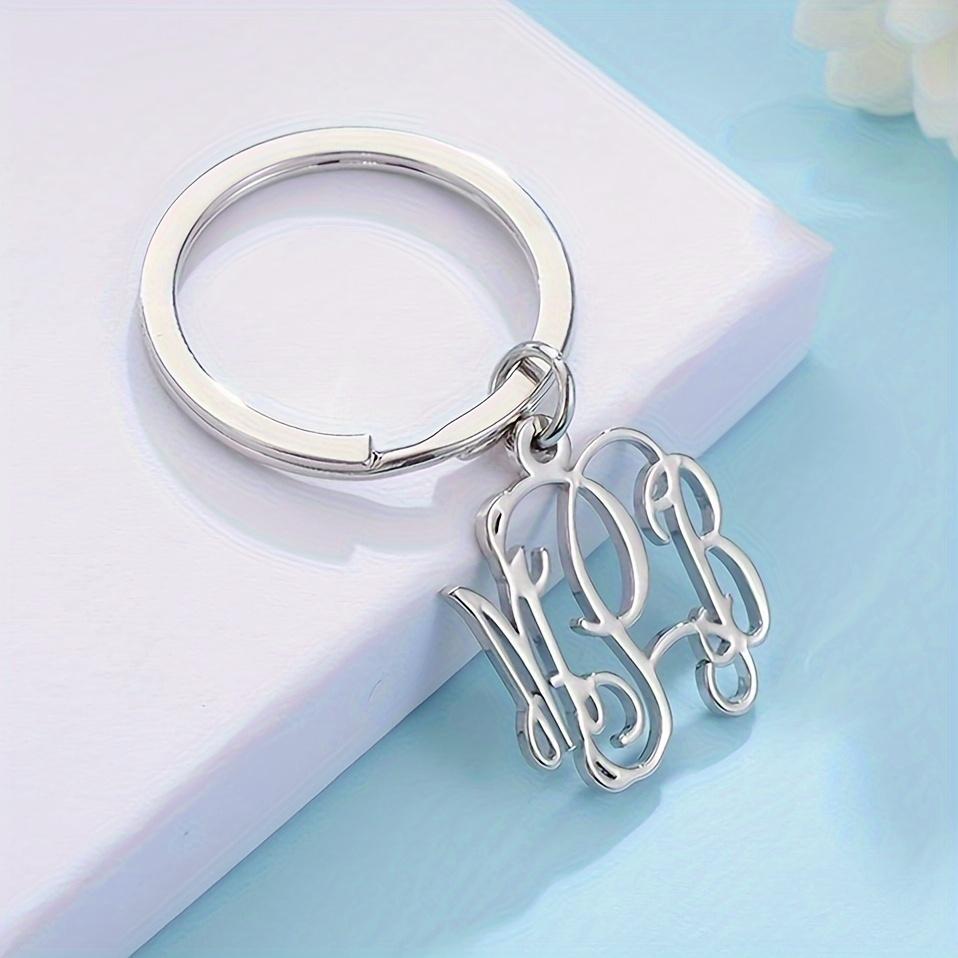 A Custom Letter Keychain Without a Chain - Elegantly Intertwined Letter Design, Unisex Heavy-Duty Key Ring - Perfect for Weddings, Anniversaries, And Birthday Gifts - Goldene Name Tag Pendant, Made of Stainless Steel, a Wedding Keepsake