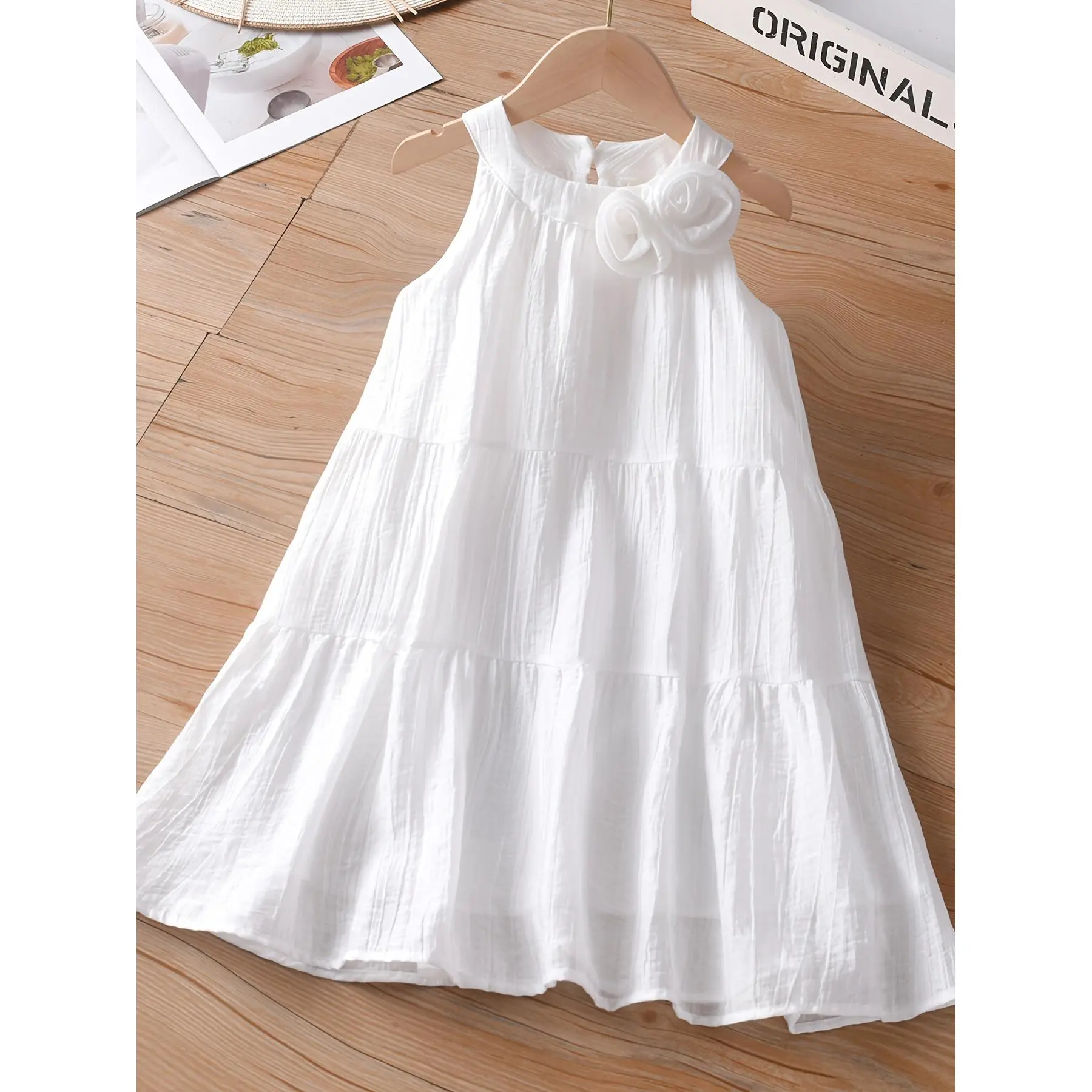 Girls' halter neck dress, new summer style, super fairy and stylish, with a unique design, white dress